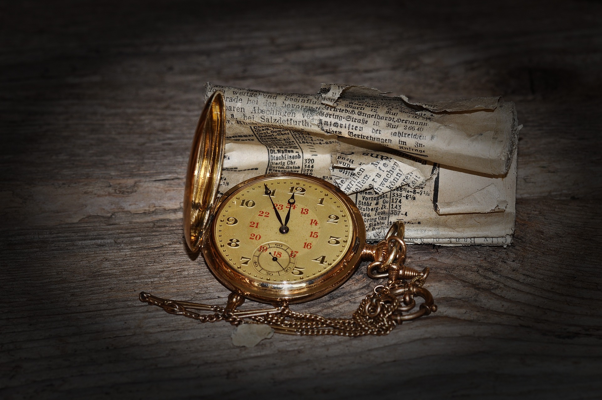 Vintage pocket watch with antique documents